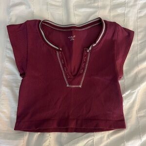 Urban Outfitters out from under tee shirt